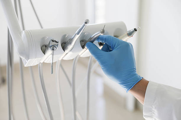 Professional Emergency Dentist technician working in Grand Haven, MI